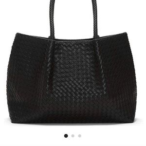Gently used black vegan leather tote! One of Oprah’s “favorite things”!